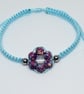Icy Blue Natural Stone Flower Bracelet with Cats Eye Centre Adjustable