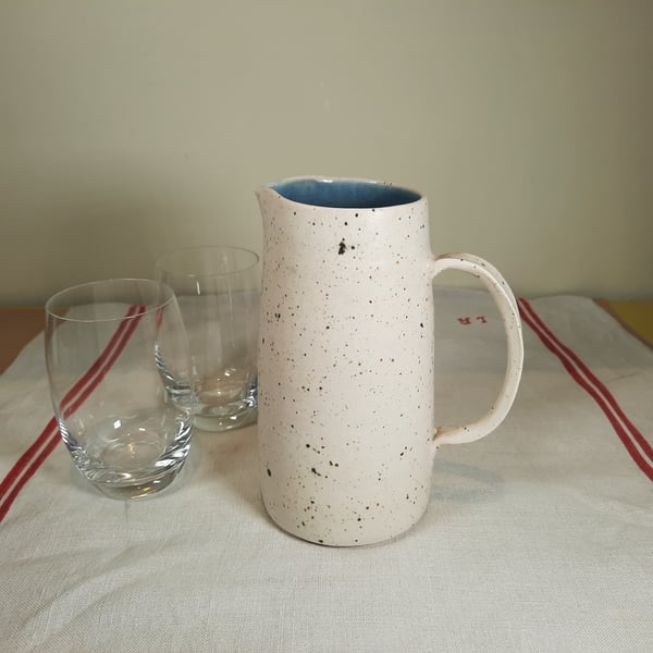 Hand thrown large blue and cream water jug