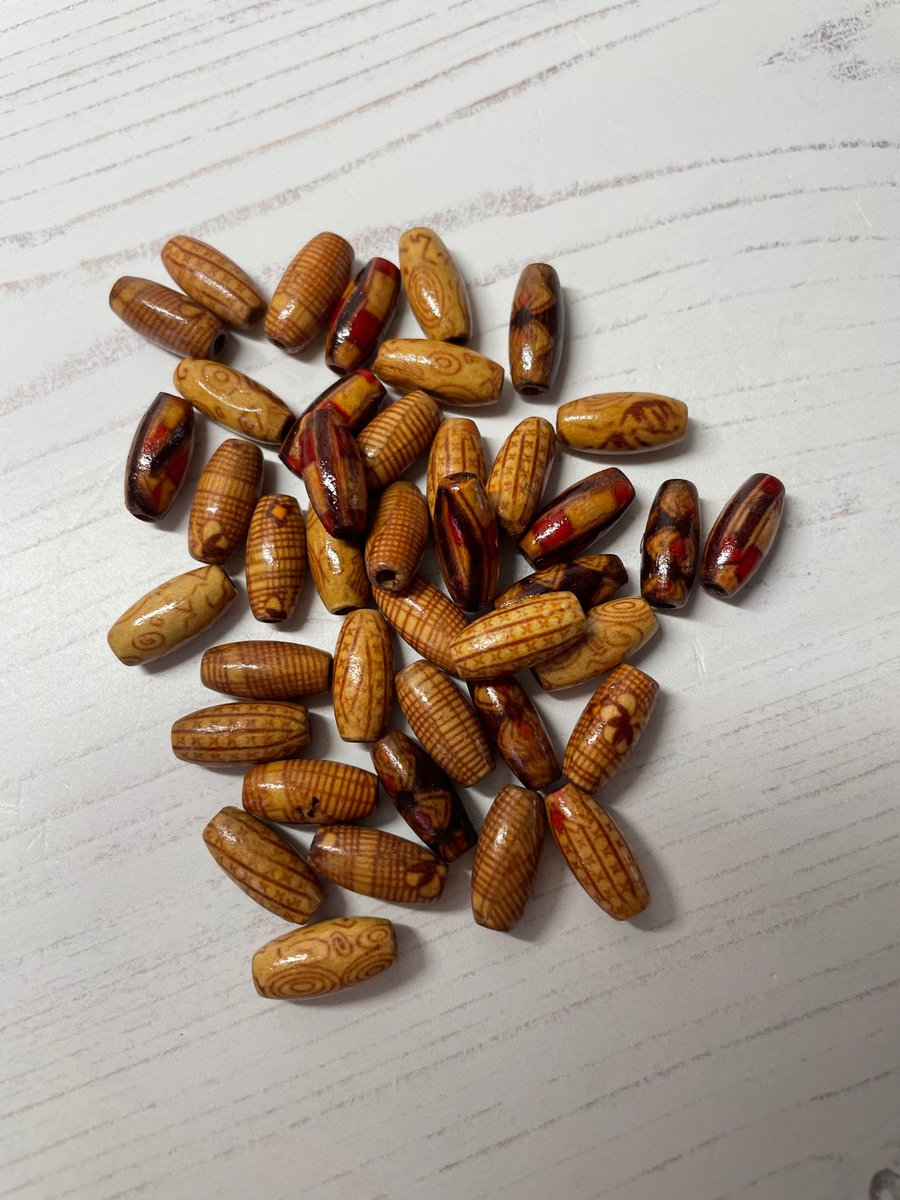 50 mixed design long oval beads S20