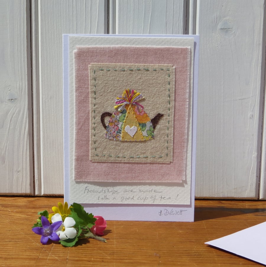 Hand-stitched Friendship card with Liberty tana lawn cotton silk threads pom pom