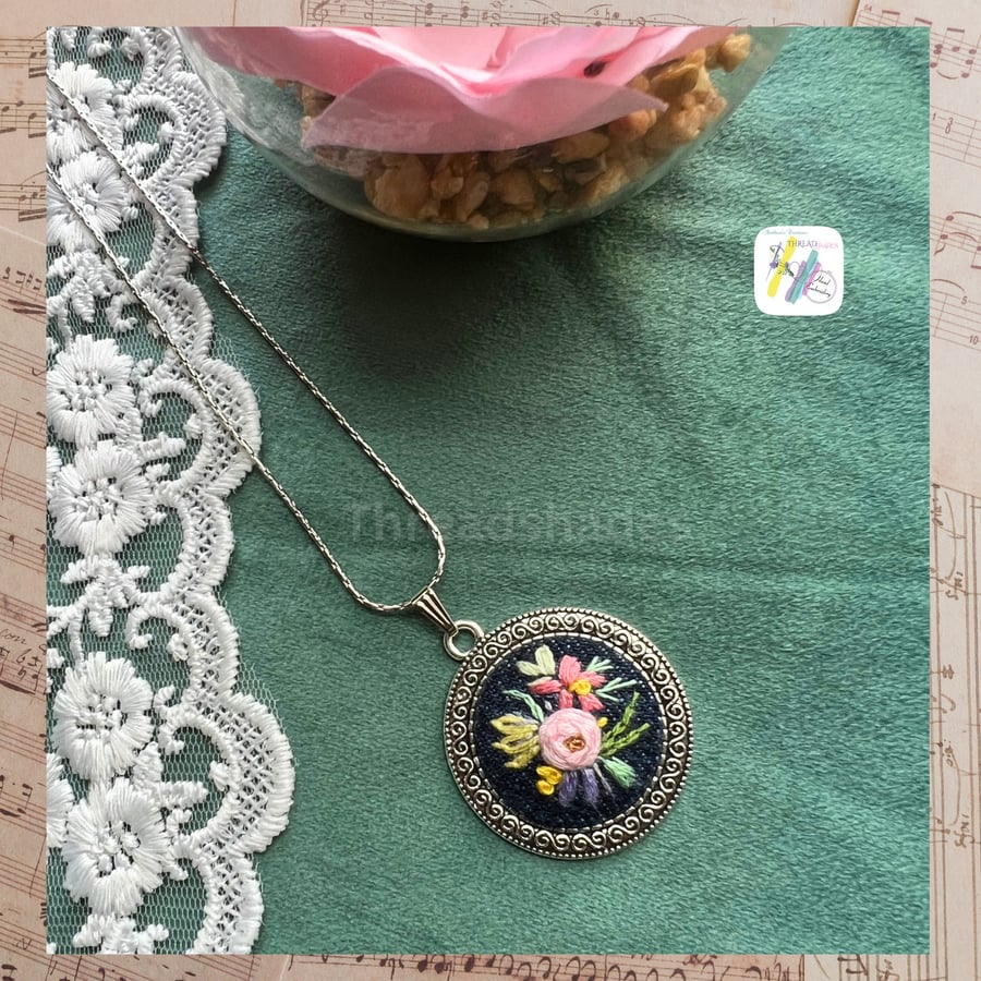Hand embroidered pendant, round antique silver look, floral design, handmade nec