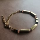 Green and peach, tea bracelet with gold. 