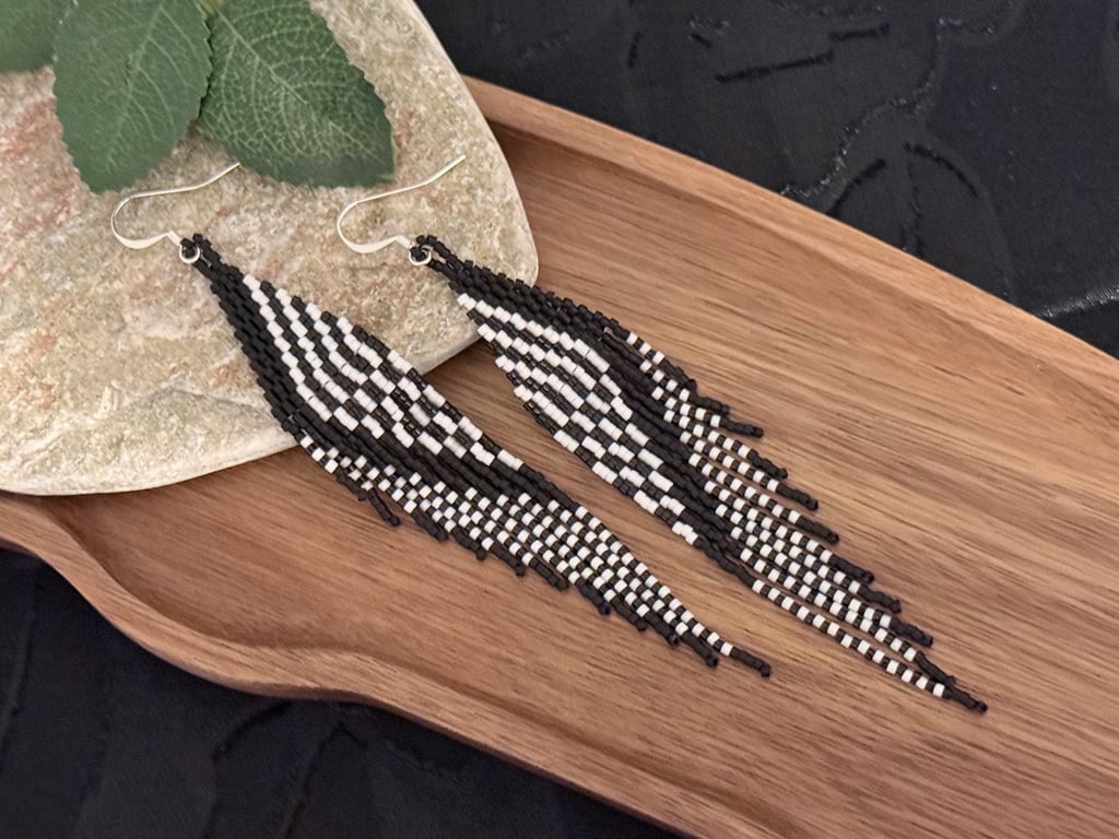 Handwoven beaded feather fringe earrings in black and white