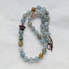 Beryl morganite necklace with howlite star on knotted cord