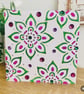 Patterned card with gemstones 