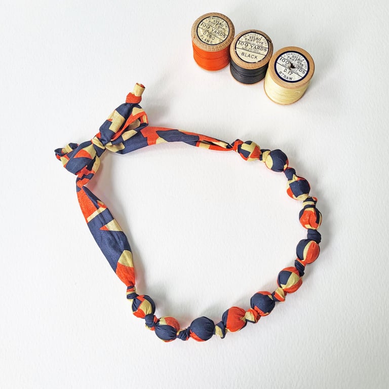 Orange, Black  & Cream or Straw Coloured Slogan Liberty Print Fabric Necklace