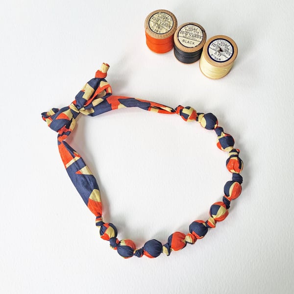 Orange, Black  & Cream or Straw Coloured Slogan Liberty Print Fabric Necklace