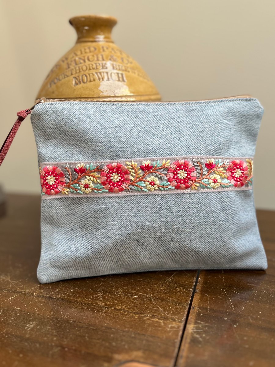 Reclaimed denim and braid zip pouch with pretty floral lining