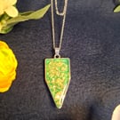 Handmade resin pendants.