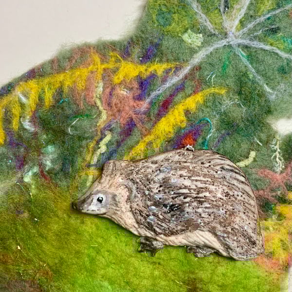 Hedgehog in a felted landscape 