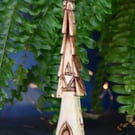 Hand carved wooden fairy house