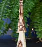 Hand carved wooden fairy house