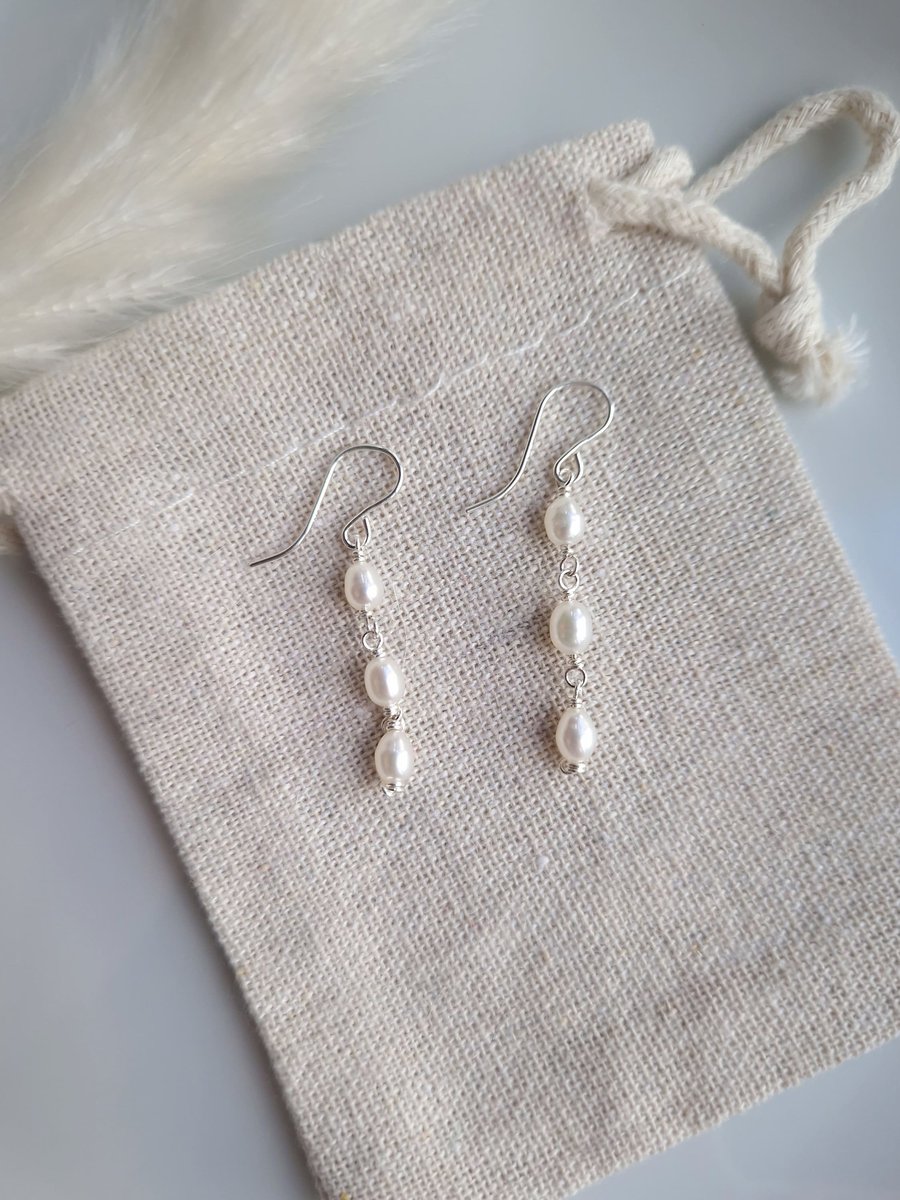 Freshwater pearl and sterling silver three drop earrings