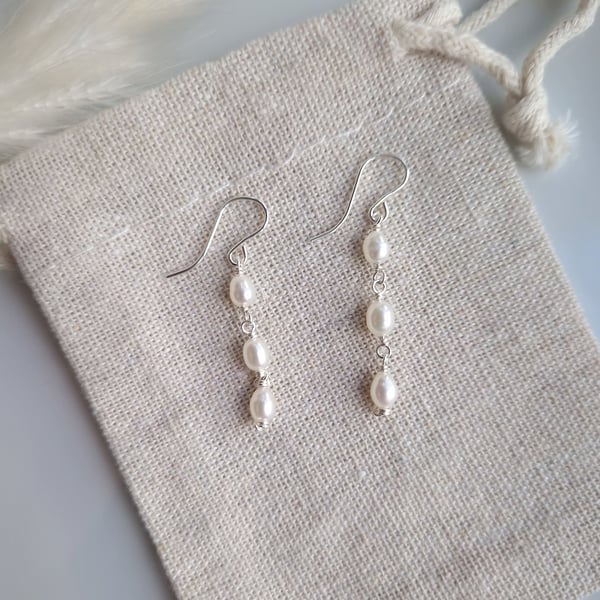 Freshwater pearl and sterling silver three drop earrings
