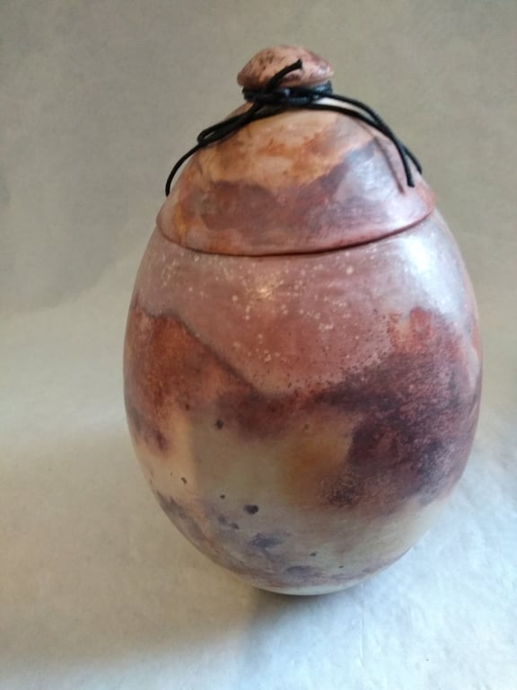  CERAMIC URN WITH TIE ON LID  26cms x 20 cms 