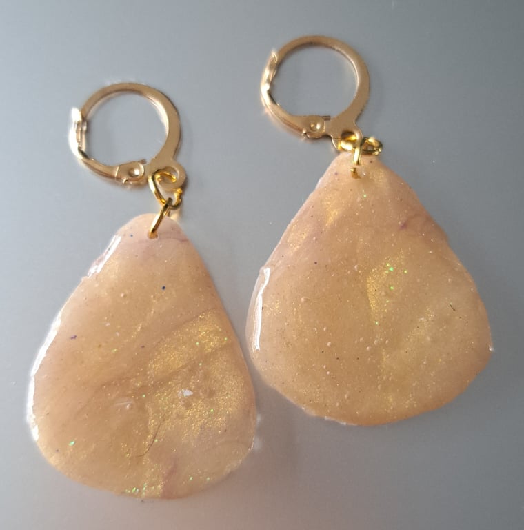 Pair of gold, yellow glitter earrings teardrop shaped 