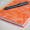 A5 Hardback Notebook with full cloth orange star cover