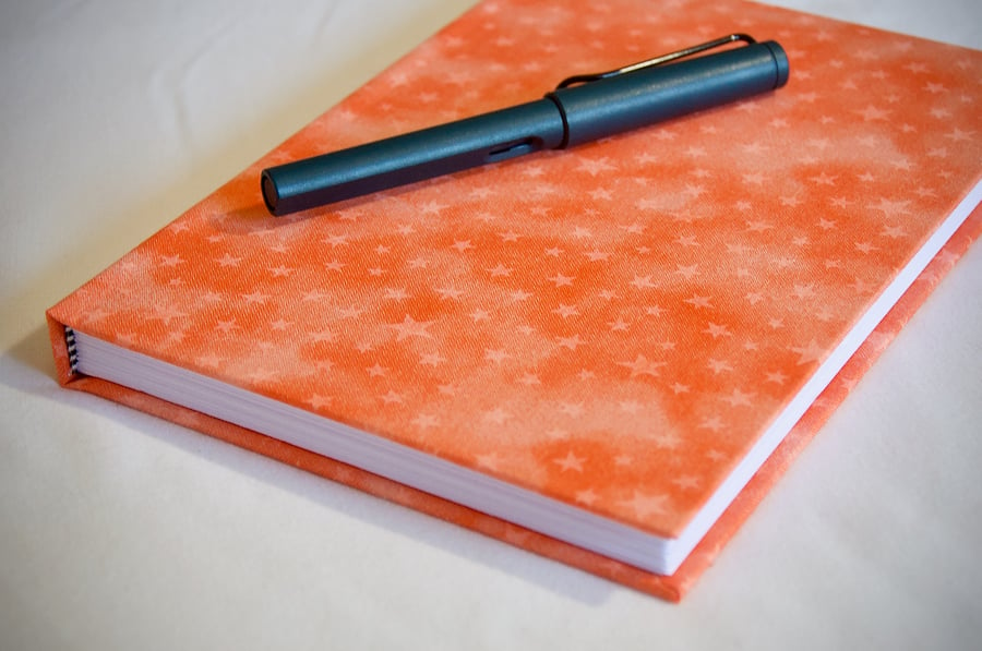 A5 Hardback Notebook with full cloth orange star cover