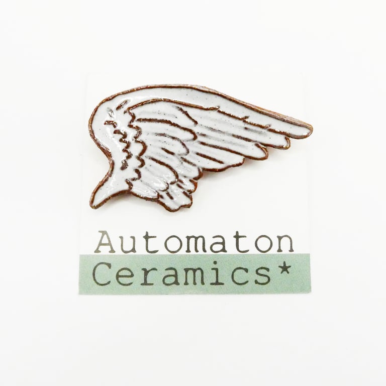 Angel wing ceramic brooch