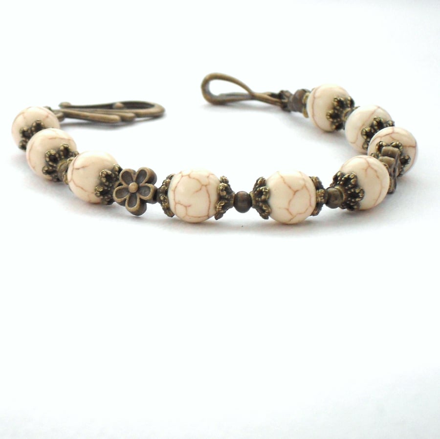 Handmade cream magnesite and bronze bracelet