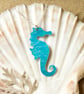 Delicate Seahorse necklace in anodised aluminium on a silver chain. - Image 1