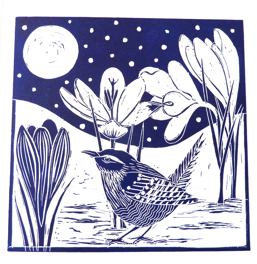 A freshly printed linocut card of a Wren amongst the Crocus