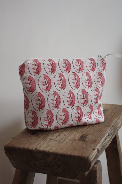 Cream and pink zip up pouch made from Vanessa Arbuthnott fabric
