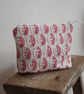 Cream and pink zip up pouch made from Vanessa Arbuthnott fabric