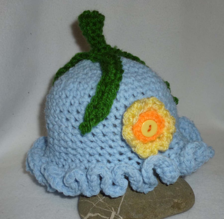 Hand crochet baby bluebell hat with decorative yellow & orange flower- 3-6months