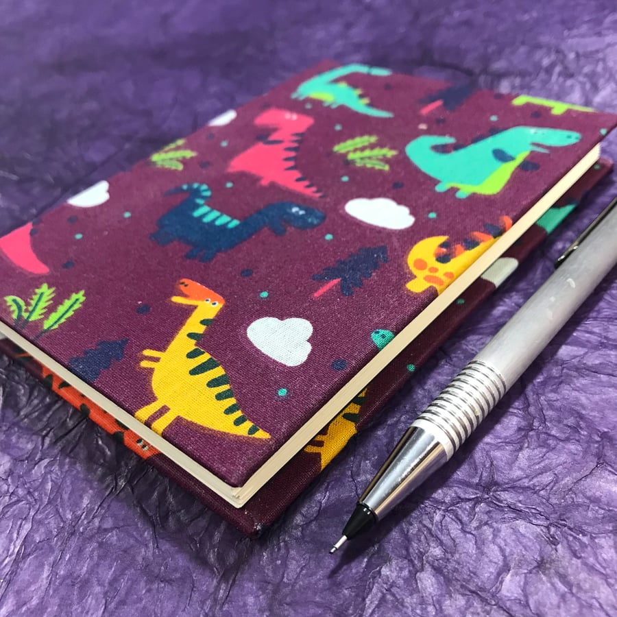 SALE! Slight second - A6 Notebook with dinosaur cover (glue imprint on cover)