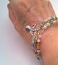 Set of 3 Stacking Memory Wire Cuff Bracelets with a Silver Plated Angel Charm - Image 4