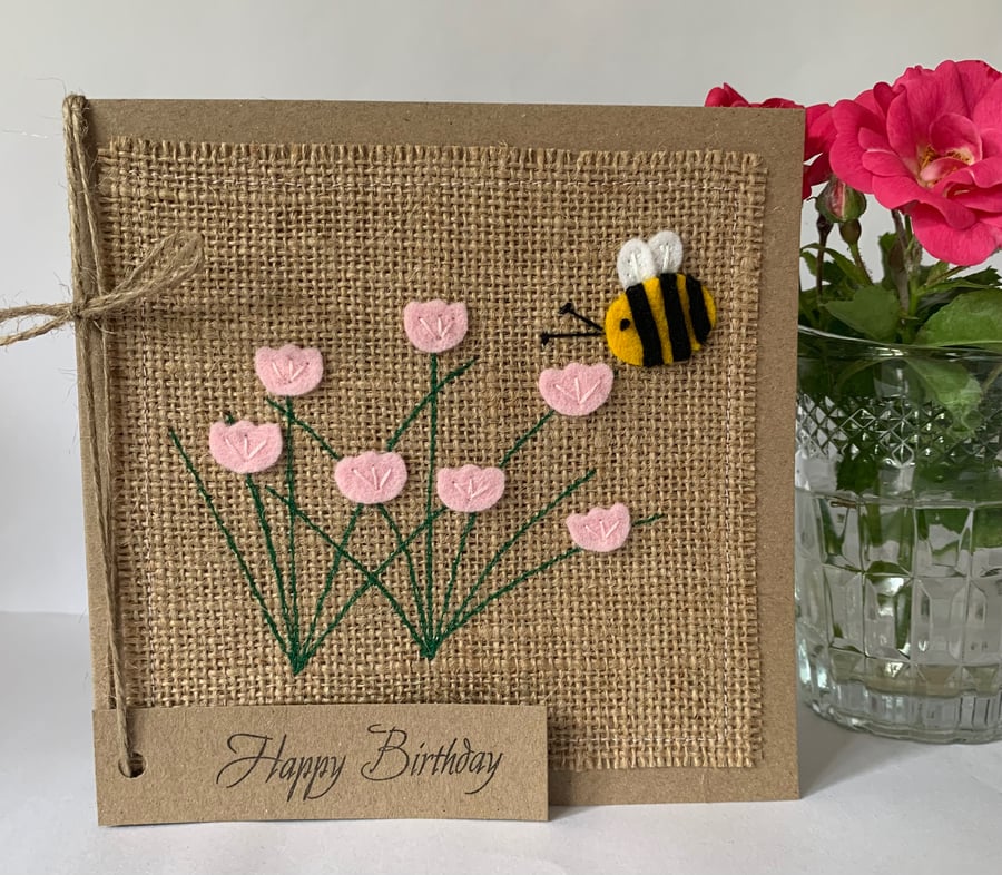 Handmade Birthday Card. Pale pink flowers with a bee from wool felt.