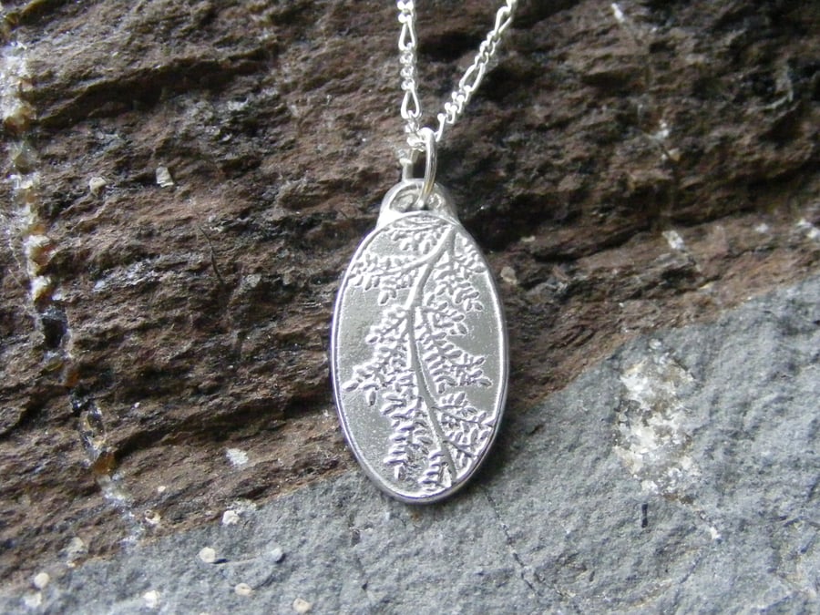 Fine Silver and Sterling Silver Pendant and Chain with Leaf Design.