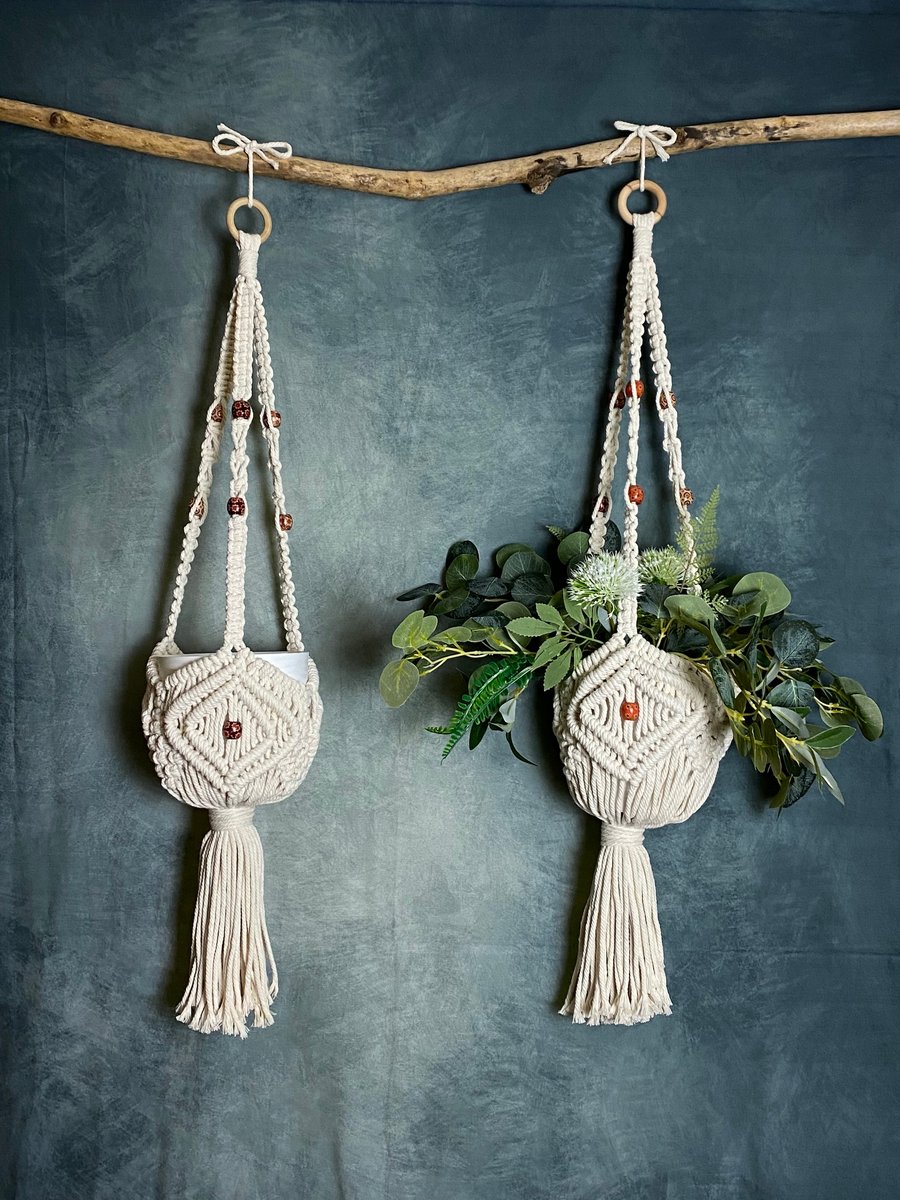 Handmade cream macrame hanging plant hanger with wooden beads