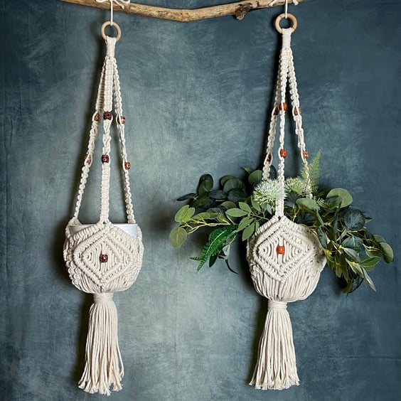 Handmade cream macrame hanging plant hanger with wooden beads