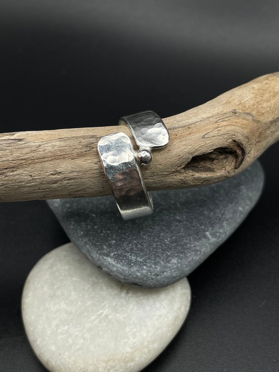 Silver hammered twist ring with tiny balancing sphere Size R