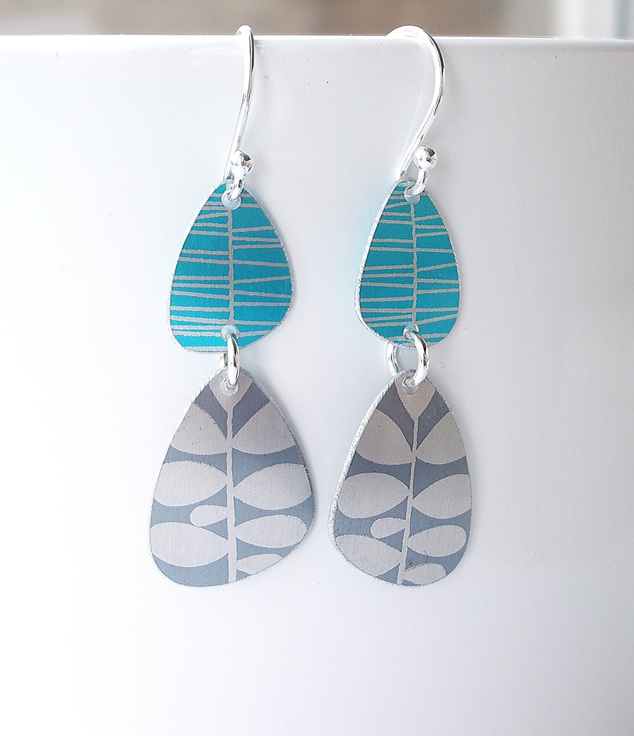 Pebble shaped mid century style turquoise and silver drop leaf earrings