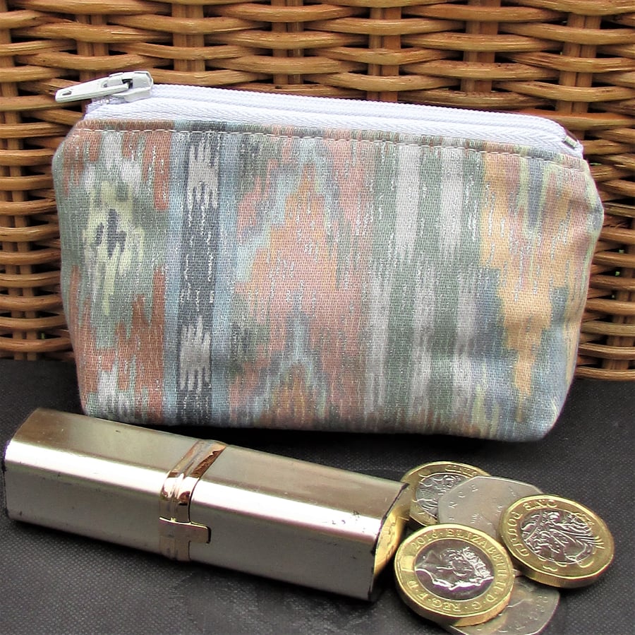 Small purse with abstract pastel print pattern