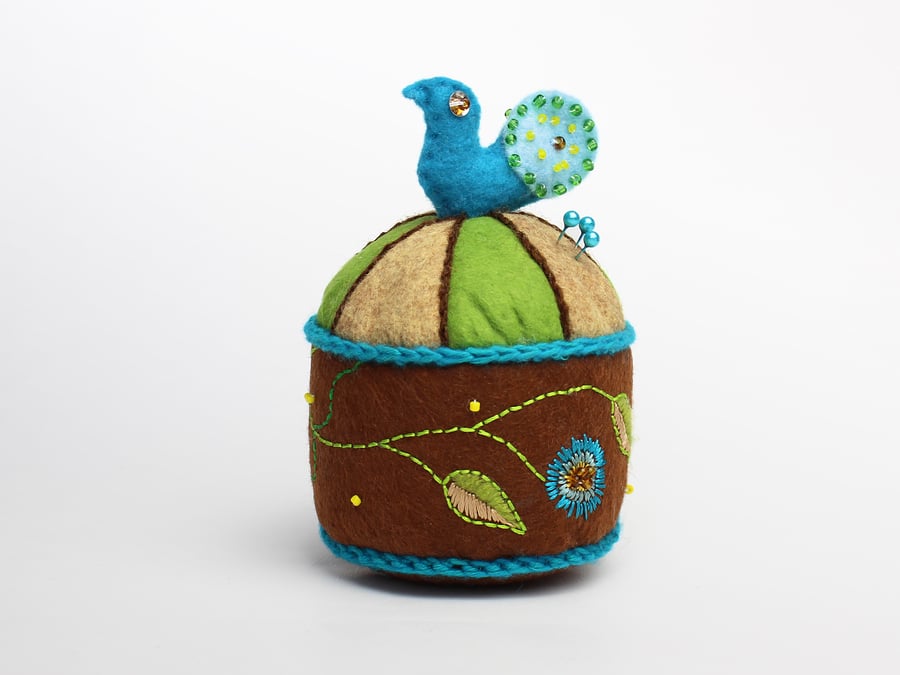 Turquoise and brown felt carousel pincushion with peacock and Katina embroidery 