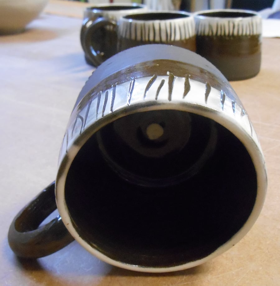 Mugs for Coffee black and white stripe with spot inside. 4 available.