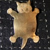 Lightly textured fat cat brooch