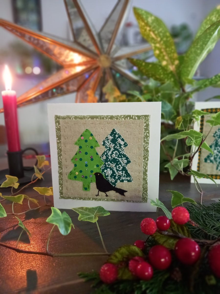 Hand stitched Christmas card, textile art card, blackbird and Christmas trees 