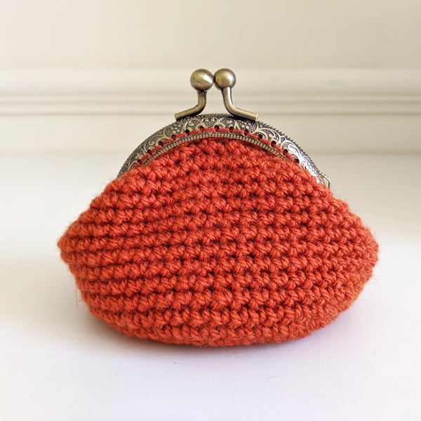 Coin Purse in Orange with embossed bronze-coloured frame