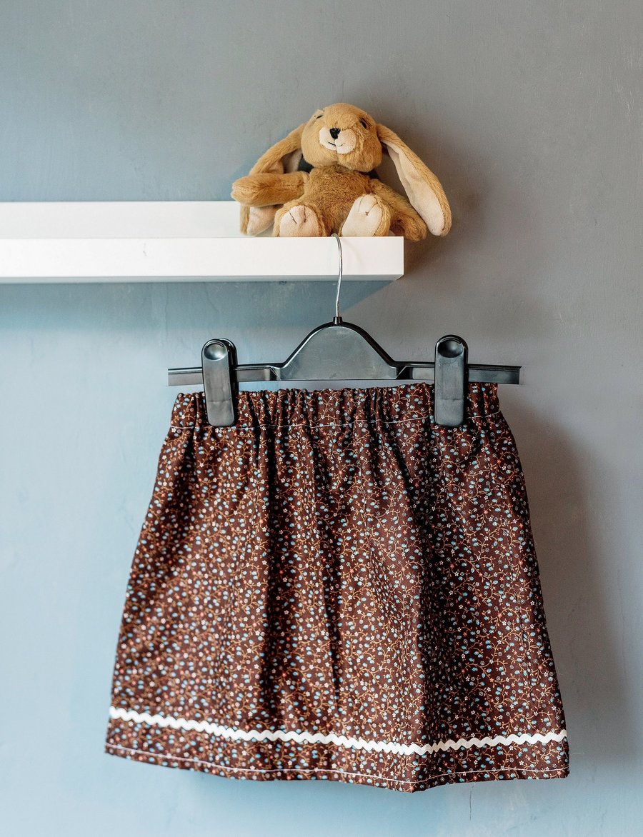 Floral children's skirt with ribbon, size 2-3