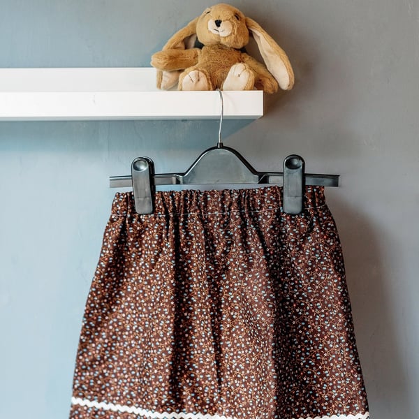 Floral children's skirt with ribbon, size 2-3