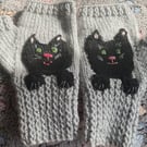 Grey mittens for adult or teenager with a black cat face and paws 