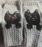 Grey mittens for adult or teenager with a black cat face and paws  - Image 1