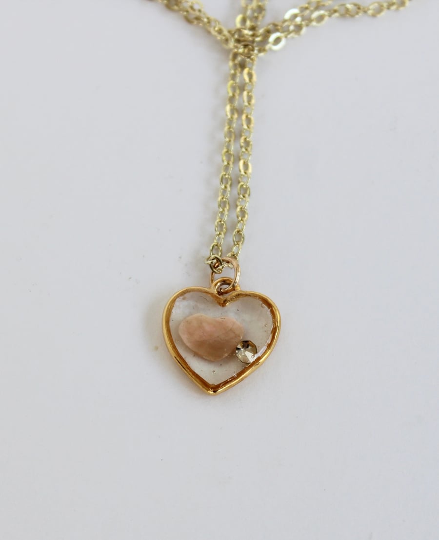 Heart with shell heart pendent 