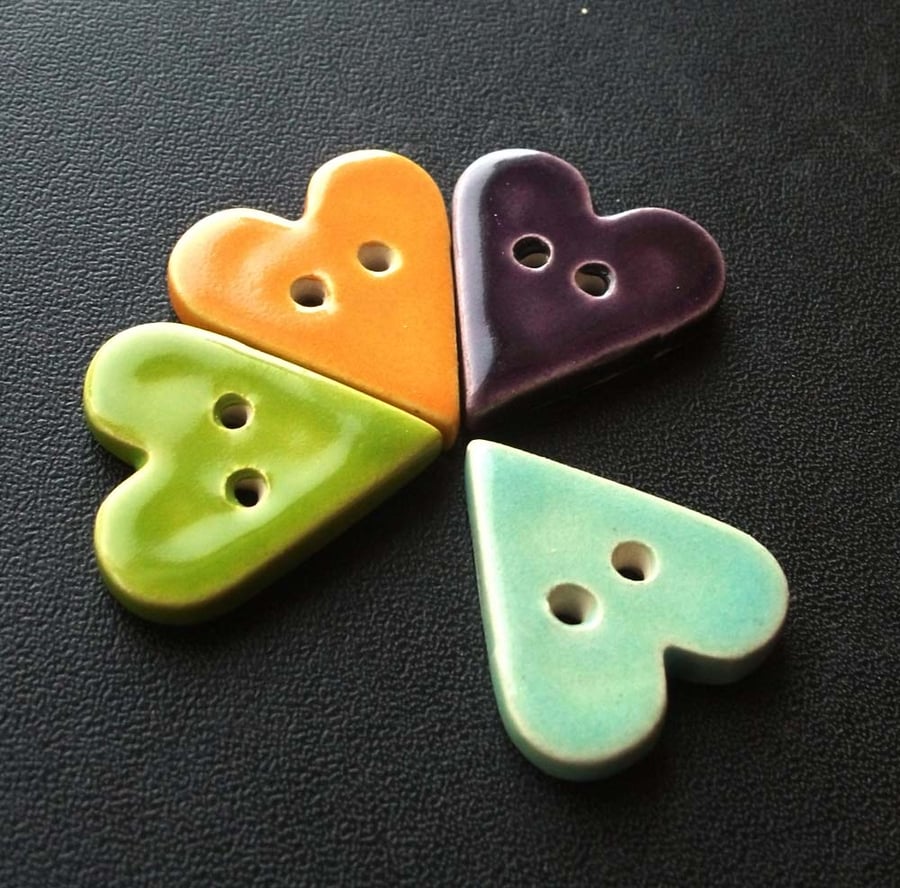 set of four bright heart ceramic buttons 