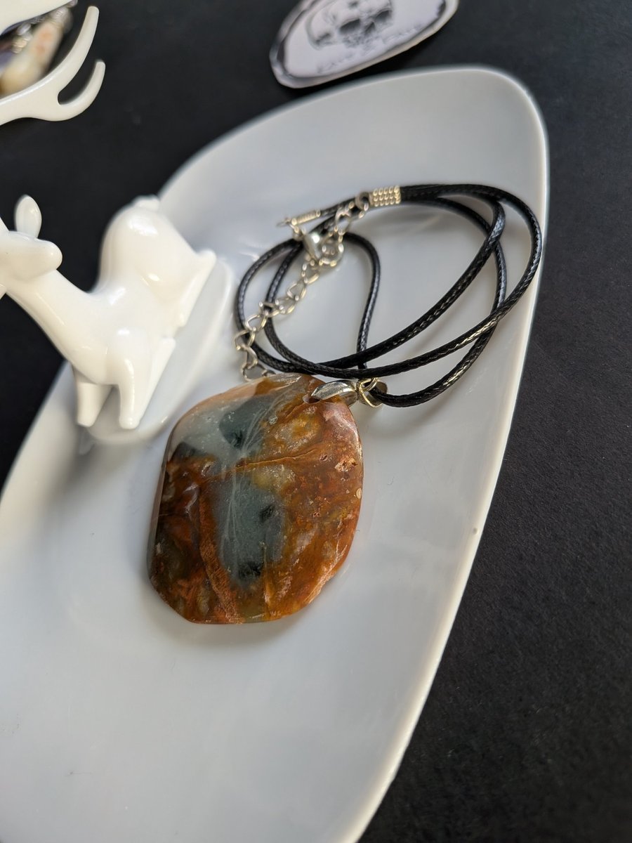 Brown and grey marbled stone pendant 